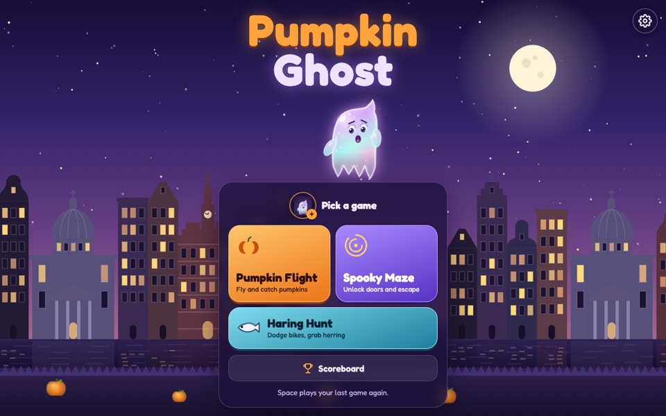 Pumpkin Ghost title screen: a ghost over Amsterdam canal houses at night, with a menu of three games